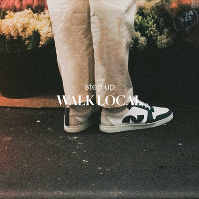chaussures noyoco vertes devant des fleurs
