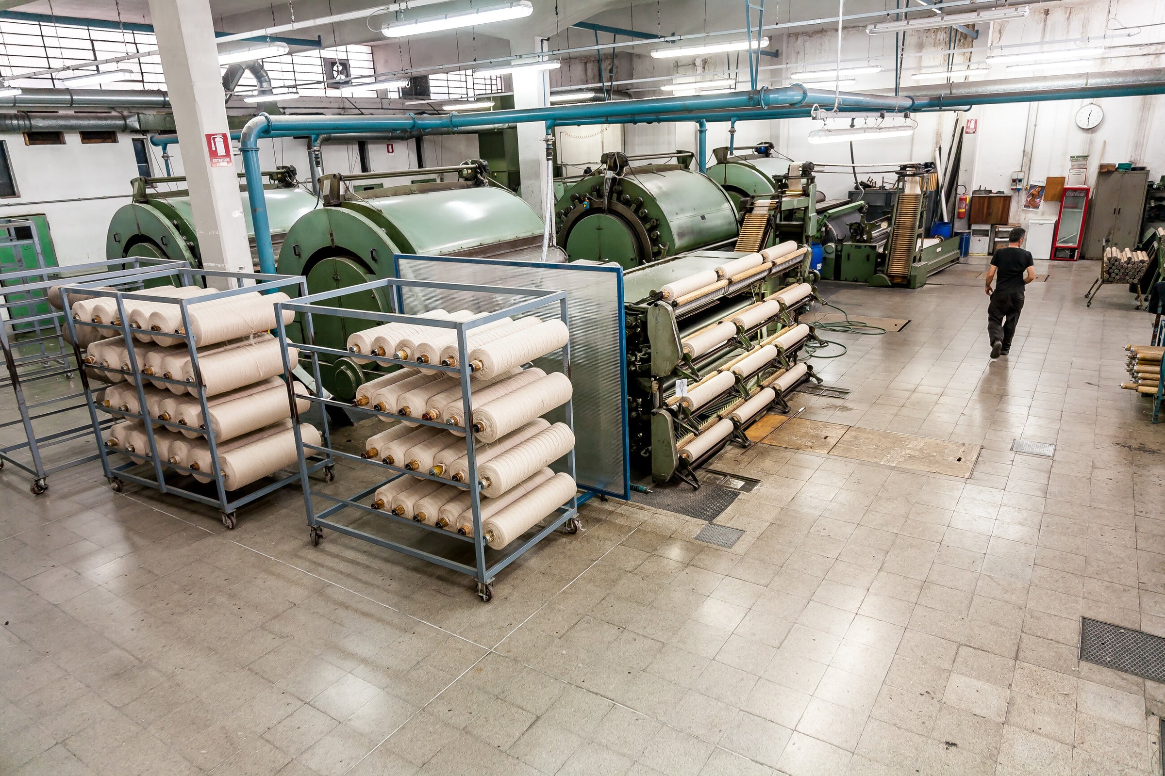 Large production hall and textile machinery at Zanieri in Prato, Italy